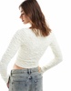 Motel crinkle long sleeve crop top in cream