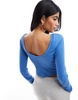 Nike mini-ribbed long sleeve scoop back top in star blue