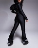 ASOS 4505 Hourglass Ski belted ski suit with slim kick leg and faux fur hood in black gloss