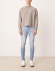 ASOS DESIGN power stretch jeans in light wash