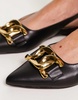 RAID flat shoes with gold buckle in black