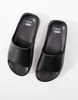 ASOS DESIGN Wide Fit Freedom cleated flatform slides in black