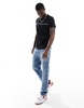 Tommy Hilfiger stripe chest slim fit T-shirt in black