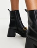 ASOS DESIGN Rani chunky mid-heeled boots with chain in black