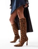 ASOS DESIGN Create heeled leather knee boots in leopard