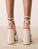 ASOS DESIGN Nikita knotted platform block heeled sandals in ivory