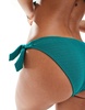 Accessorize crinkle bunny tie side bikini bottom in teal