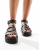 Truffle Collection wide strap sandals in black