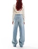 COLLUSION X002 baggy jeans with let down hems in midwash blue