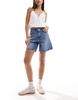 Levi's high waist baggy denim shorts in mid blue