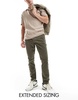 ASOS DESIGN tapered fit corduroy pants with elastic waist in khaki