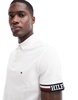 Tommy Hilfiger flag logo cuff slim polo shirt in white