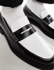 ASOS DESIGN penny loafers in black and white