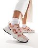 Nike Tech Hera sneakers in orange and pink