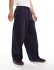 ASOS DESIGN baggy balloon fit cord pants with pleats in navy blue