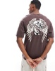 ADPT oversized washed sinister back print t-shirt in brown