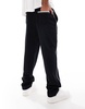 ASOS DESIGN straight leg sweatpants with embroidery and tipping details in black