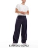 ASOS DESIGN baggy balloon fit cord pants with pleats in navy blue