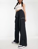 Columbia Cleetwood Cove oversized cargo sweatpants in black exclusive to ASOS