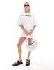 Noisy May oversized t-shirt dress with slogan in white