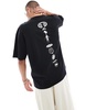 ASOS DESIGN boxy oversized t-shirt with celestial chest and spine print in black