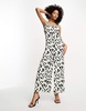 River Island leopard print tie strap wide leg jumpsuit in black and white