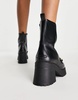 ASOS DESIGN Rani chunky mid-heeled boots with chain in black