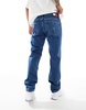 Tommy Jeans Ryan regular straight jeans in mid wash with flag detail