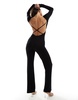 ASOS DESIGN long sleeve flared leg jumpsuit with open back and strap detail in black