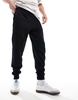 ASOS DESIGN essential tapered sweatpants in black