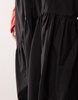 COLLUSION Plus cotton poplin midi skirt with asymmetric hem in black