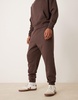 ASOS DESIGN essential oversized sweatpants in brown