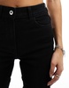 COLLUSION high rise skinny jeans in black