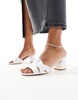 Truffle Collection block heel mule sandals in white