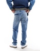 Tommy Jeans Ethan relaxed straight jeans in mid wash