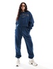 Nike Mini Swoosh sweatpants in navy