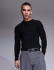 ASOS DESIGN muscle fit long sleeve rib t-shirt with henley neck in black