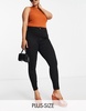 River Island Plus high rise skinny jeans in black