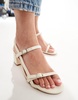 Truffle Collection block heeled sandals in white