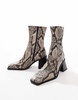 ASOS DESIGN Ria mid heel leather boots in natural snake