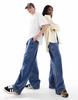 COLLUSION Unisex baggy skate jeans in midwash