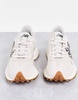 New Balance 327 sneakers in off-white with leopard print detail