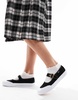 Vans Mary Jane sneaker flats in black and white