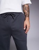 ASOS DESIGN premium heavyweight tapered sweatpants in washed black