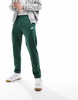 Nike Club Fleece sweatpants in green