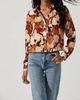 yesenia abstract print long sleeve top in black rust floral