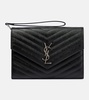 Monogram embossed leather clutch