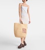 Slit Large leather-trimmed raffia tote bag