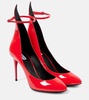 Decollete patent leather pumps