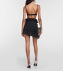 Ruffle-trimmed asymmetric miniskirt